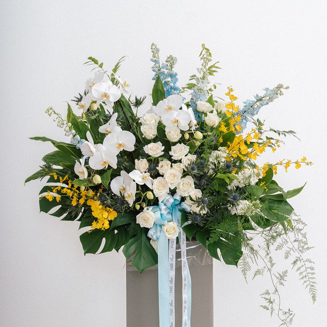 Lush Delphinium and Orchid Floral Stand